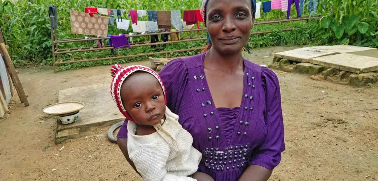 Dinatu John avec son plus jeune enfant. Sa famille essaie tant bien que mal de faire face aux conditions de vie difficiles du camp de réfugiés de Kuru. (csi)